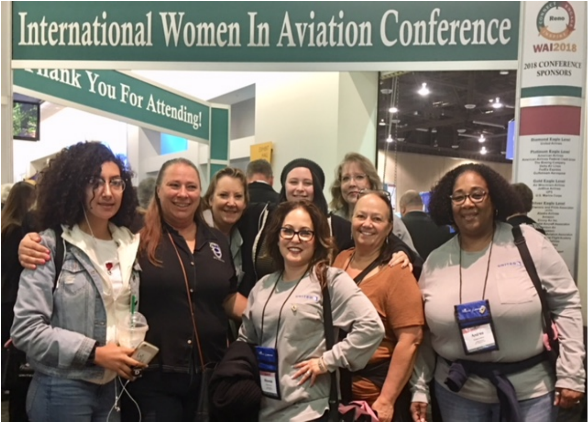 Pictured are some the participants from SFO: Jet Shop Chief Steward Deborah Ward-Crummey - Technician, Dorothy McClain - SFOWR Metal Spray/Flame Spray, Rhonda Bustillos-Rivera SFOWR Welder, Sharon Dimatteo - SFOJJ Stores, Candice King SFOWR Welder and Andrea Coleman Maintenance Planning Analyst - MPA . Also shown are two High School students learning about Careers in Aviation, Arelly Benavidez (15) Galt High School - Sophmore and Lillian Crummey - (15) Vision in Education/Delta College - Sophmore