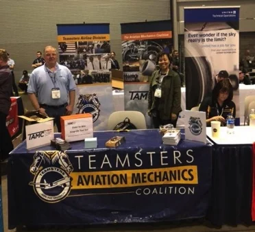 International Representative Chris Moore and Deputy Division Director Allynn Allen manning the Airline Division Booth at STEM
