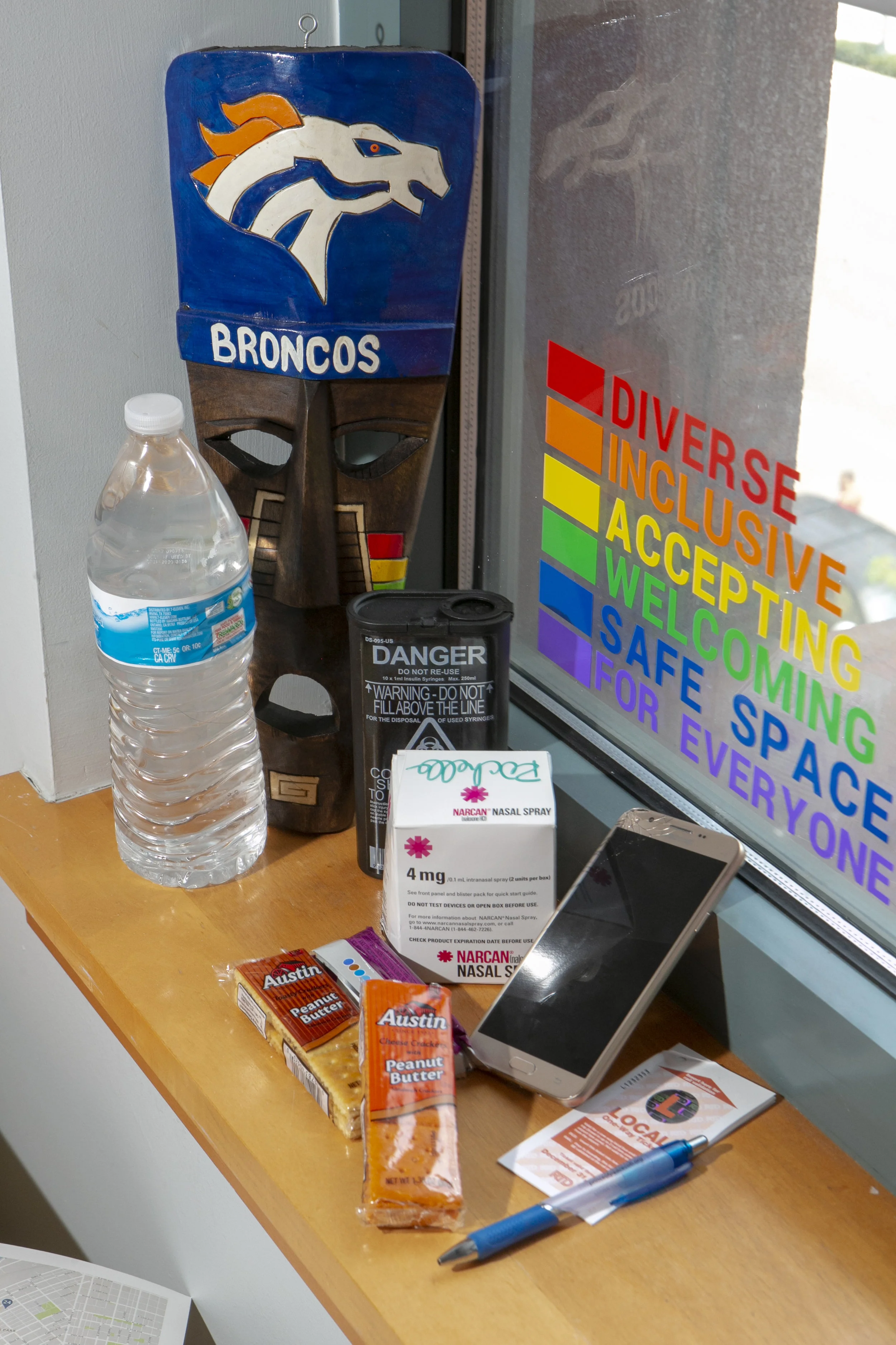 The Denver Public Library Community Resource Specialists carry a blend of supplies to help unhoused customers. The supplies include everyday necessities like socks, snacks, and water. The team also carries the life-saving tool Narcan, a nasal spray used to treat emergency opioid overdose. Elissa Hardy, community resource manager, introduced the Narcan treatment program to the library in 2015. Currently, 400 DPL library staff are trained to administer Narcan in emergencies and in the past year have saved 17 lives.