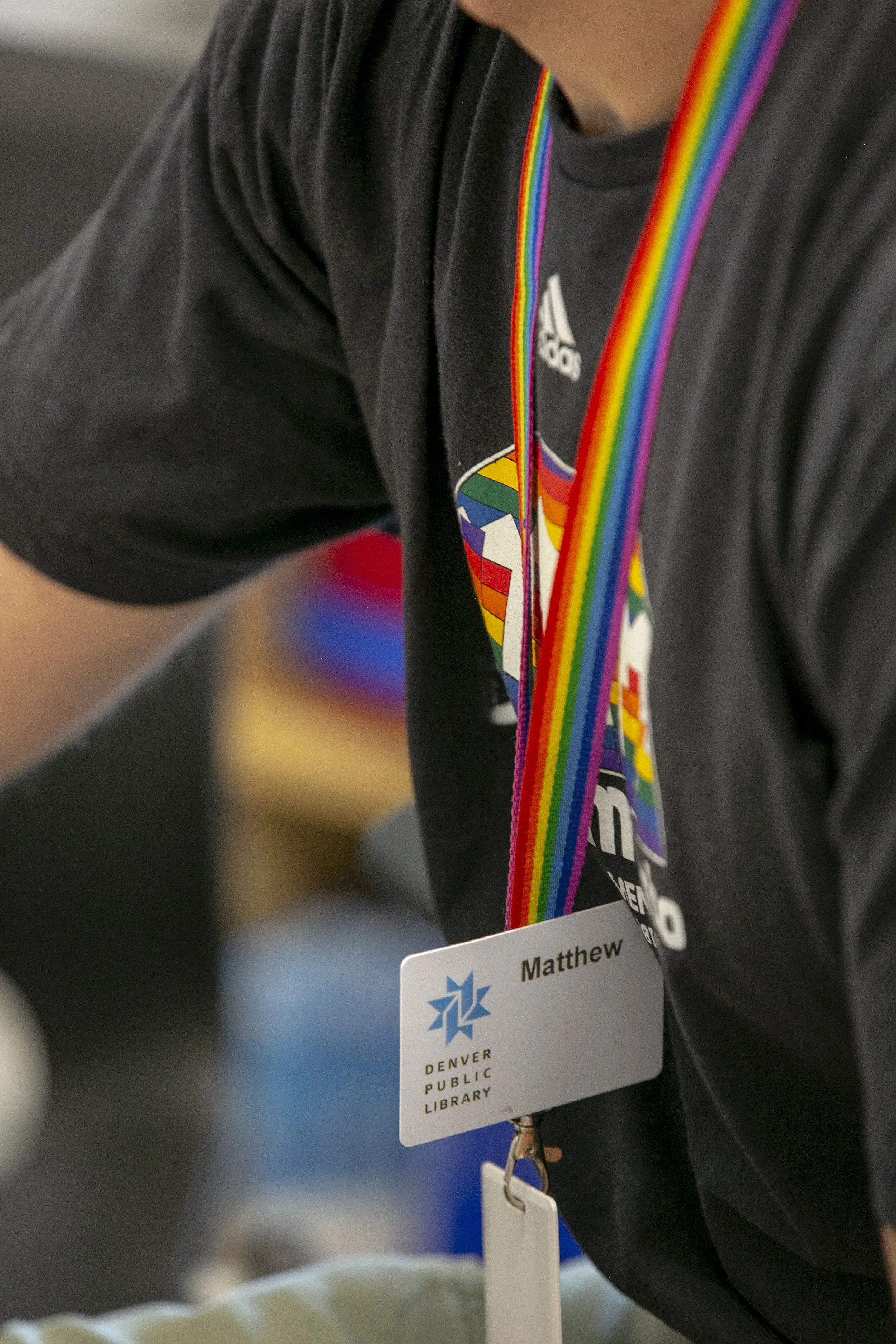 The Community Resource team wear rainbow laniards which are unique within the library system. The laniards show that the Community Resource team members are safe to talk about any subject. “I haven’t ever worked with an organization in the past that was as bold and as concerned about being inclusive and really trying to meet the needs of the most vulnerable members of our community,” said Alix Midgley, a social worker with the Denver Public Library. “Every organization has room to grow there, but it feels like we are really supported by our administration within the library in the work that we’re doing.”