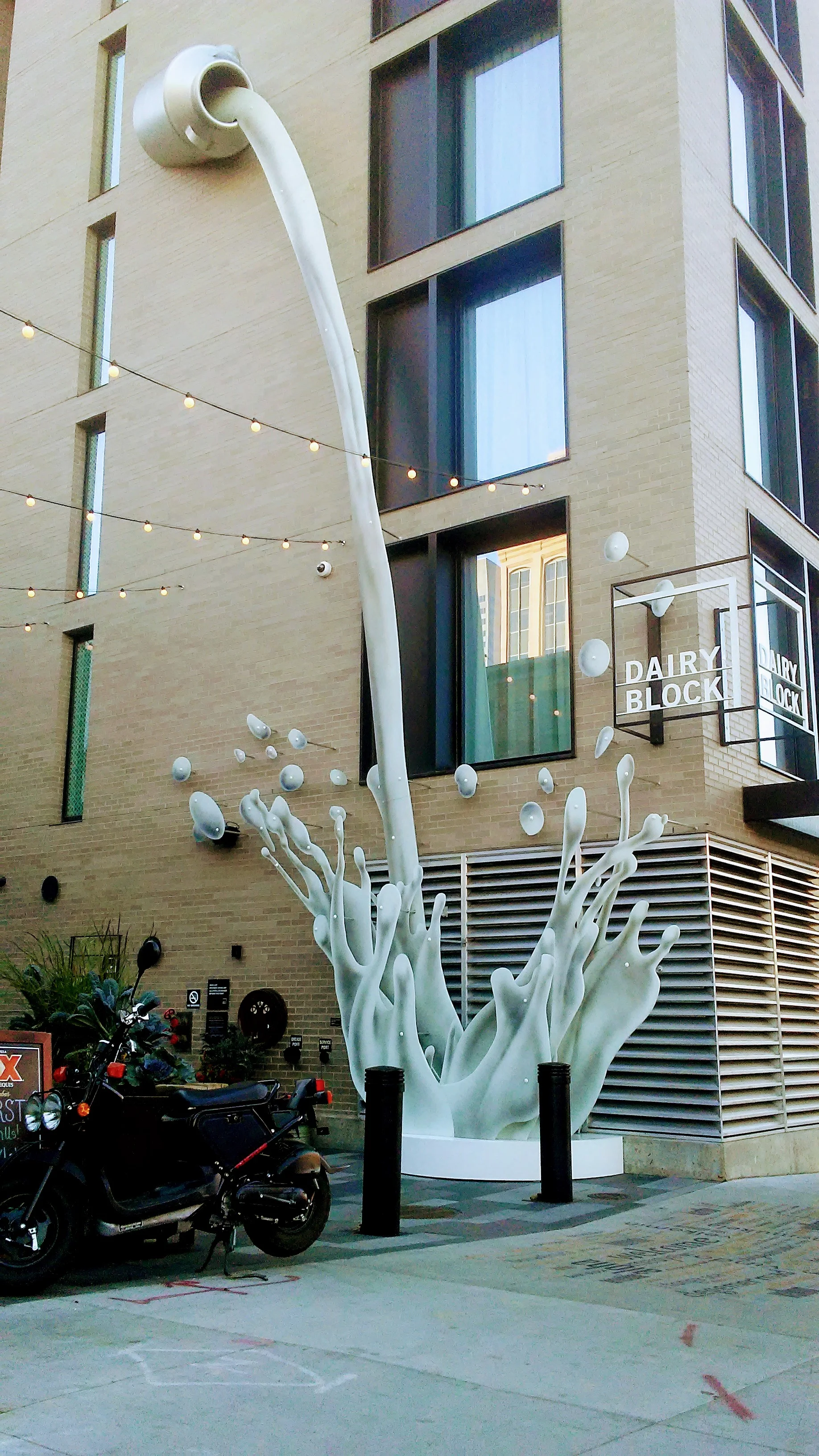 A sculpture of pouring milk in the Dairy Block, located in Lower Downtown at 1800 Wazee St. (Credit: Larmarques Smith)