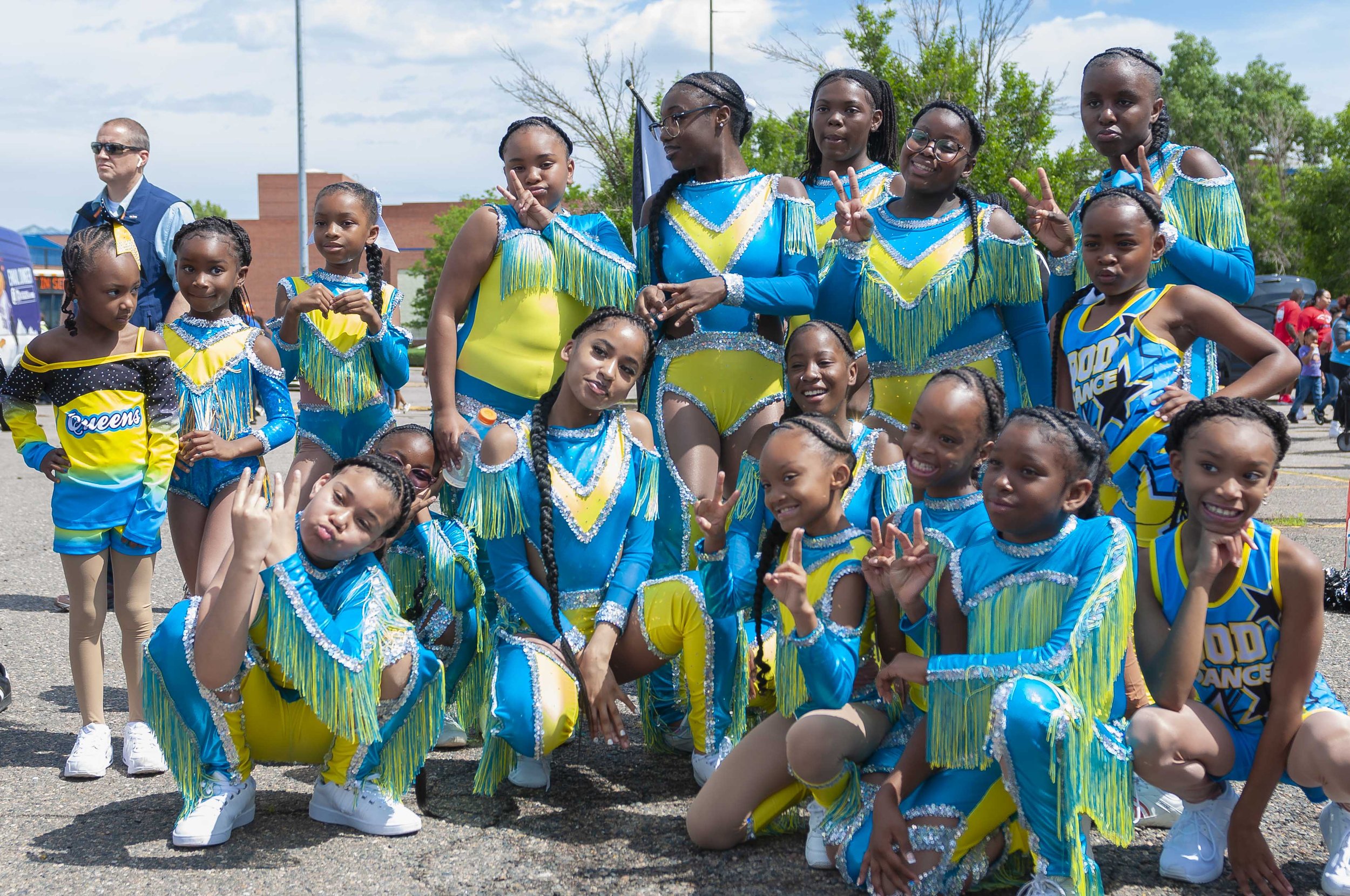   Queens of Kings of Dynasty Dance troupe pose before getting ready for the parade.  