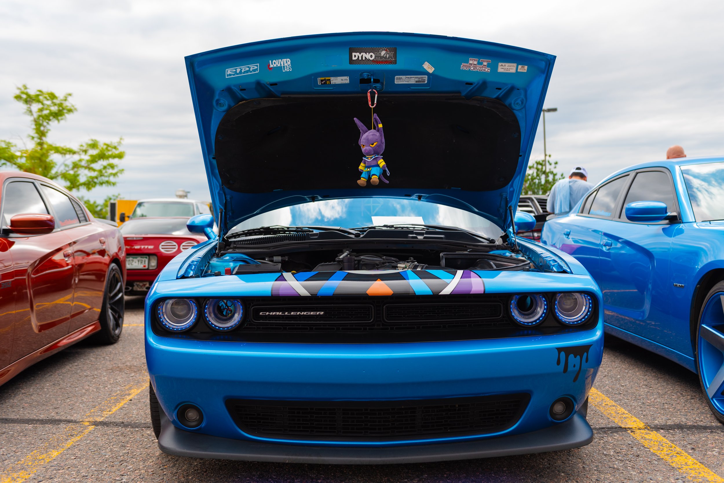  Photo: Adrian Michael  Dodge Charger with a Chibi Beerus from Dragon Ball Z doll hangs from the hood. 