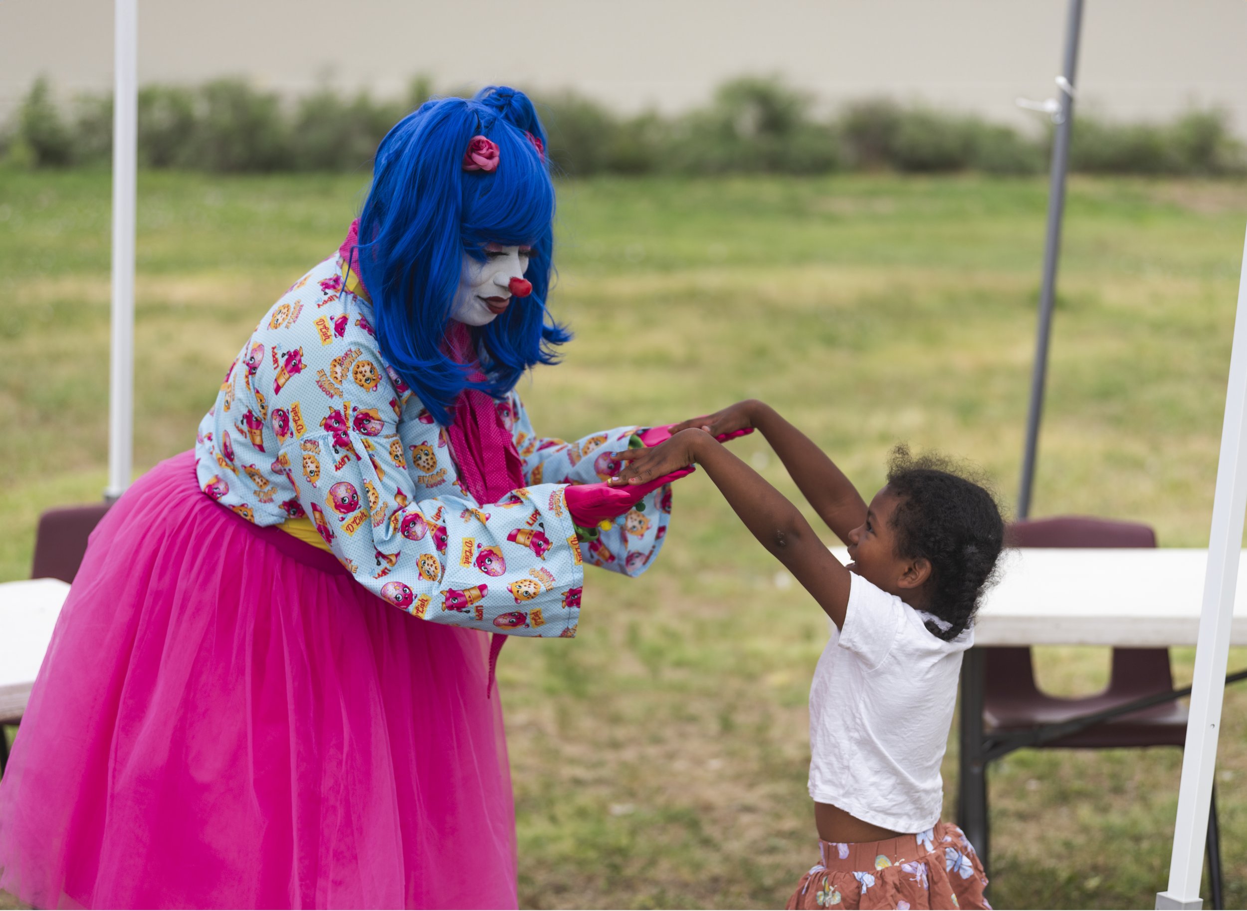  A little girl shows BlahAwesome her fingernails. Photo: Adrian Michael 