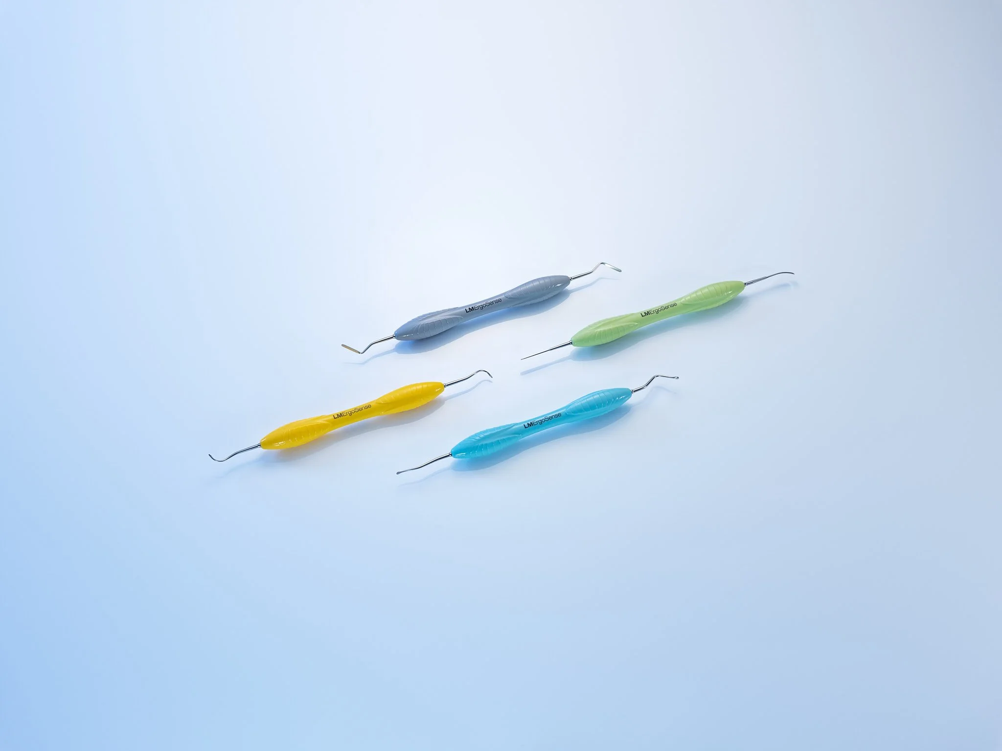 Medical dental instruments on a blue background