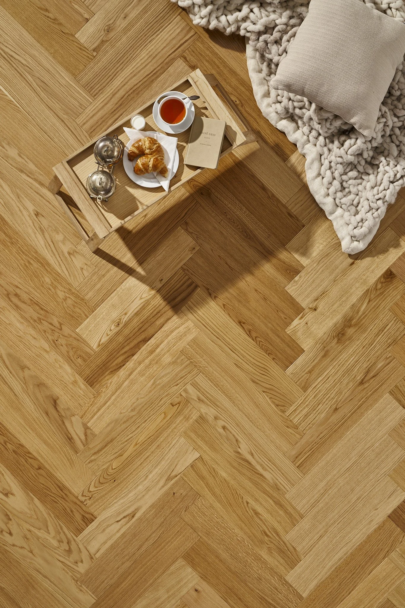 Timberwisen lattian tuotekuva kuvattuna auringon säteissä