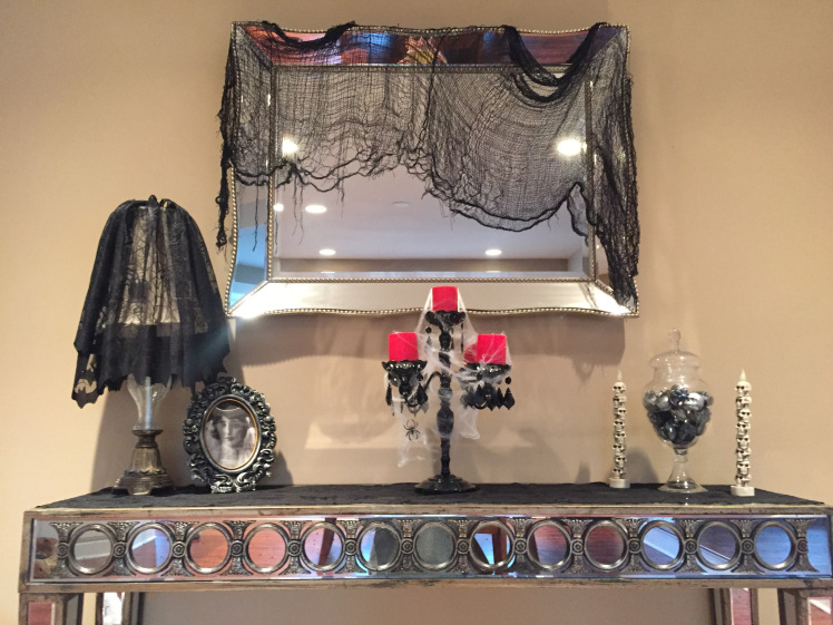 I bought most of this decor this season. I love my fancy candle holder I found at Michaels. I also love that seasonal items are usually half off right away at Michaels! 