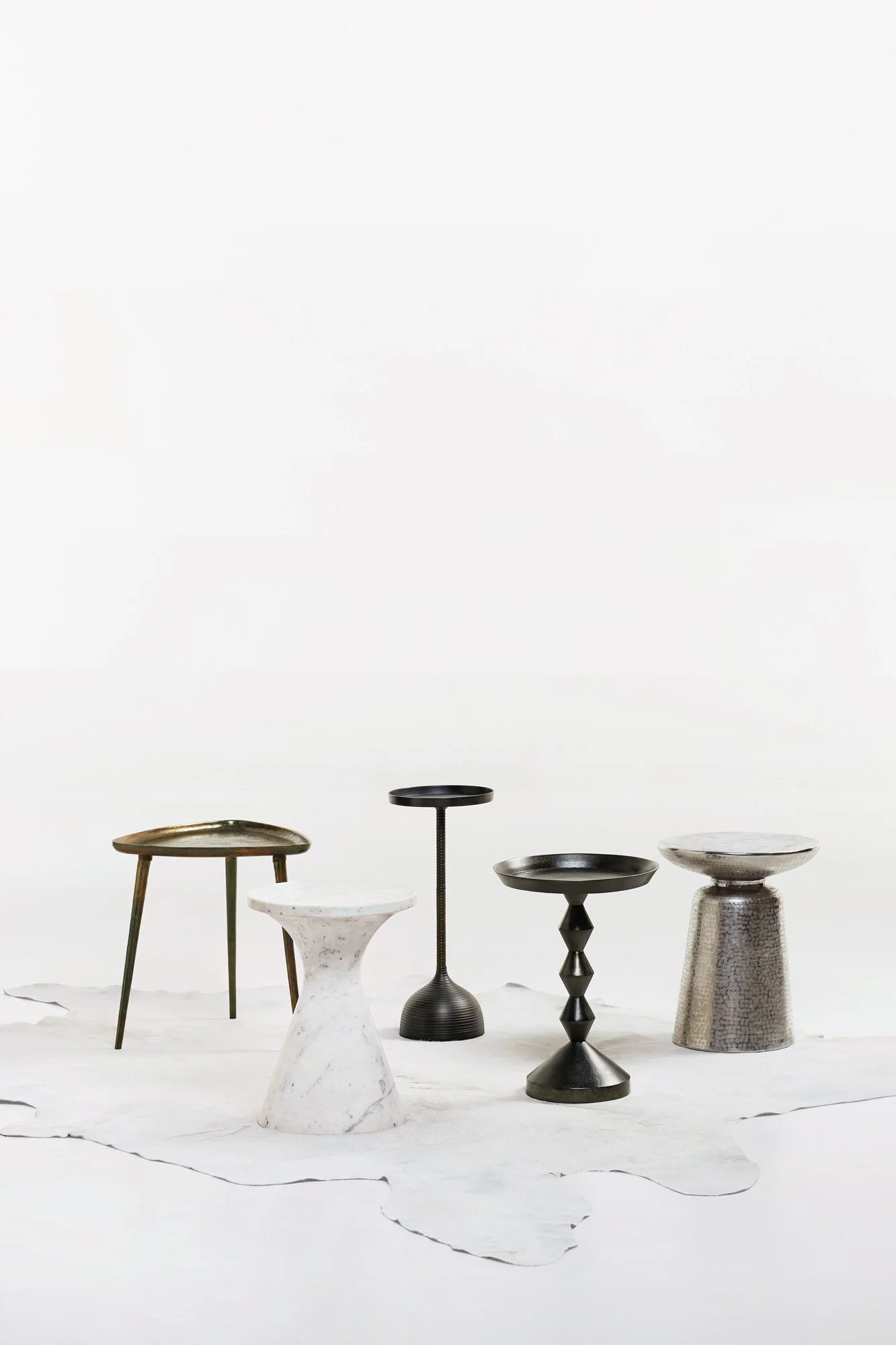 Modern and Minimal Black, White, Brass, Marble Side Tables Styled on Cowhide
