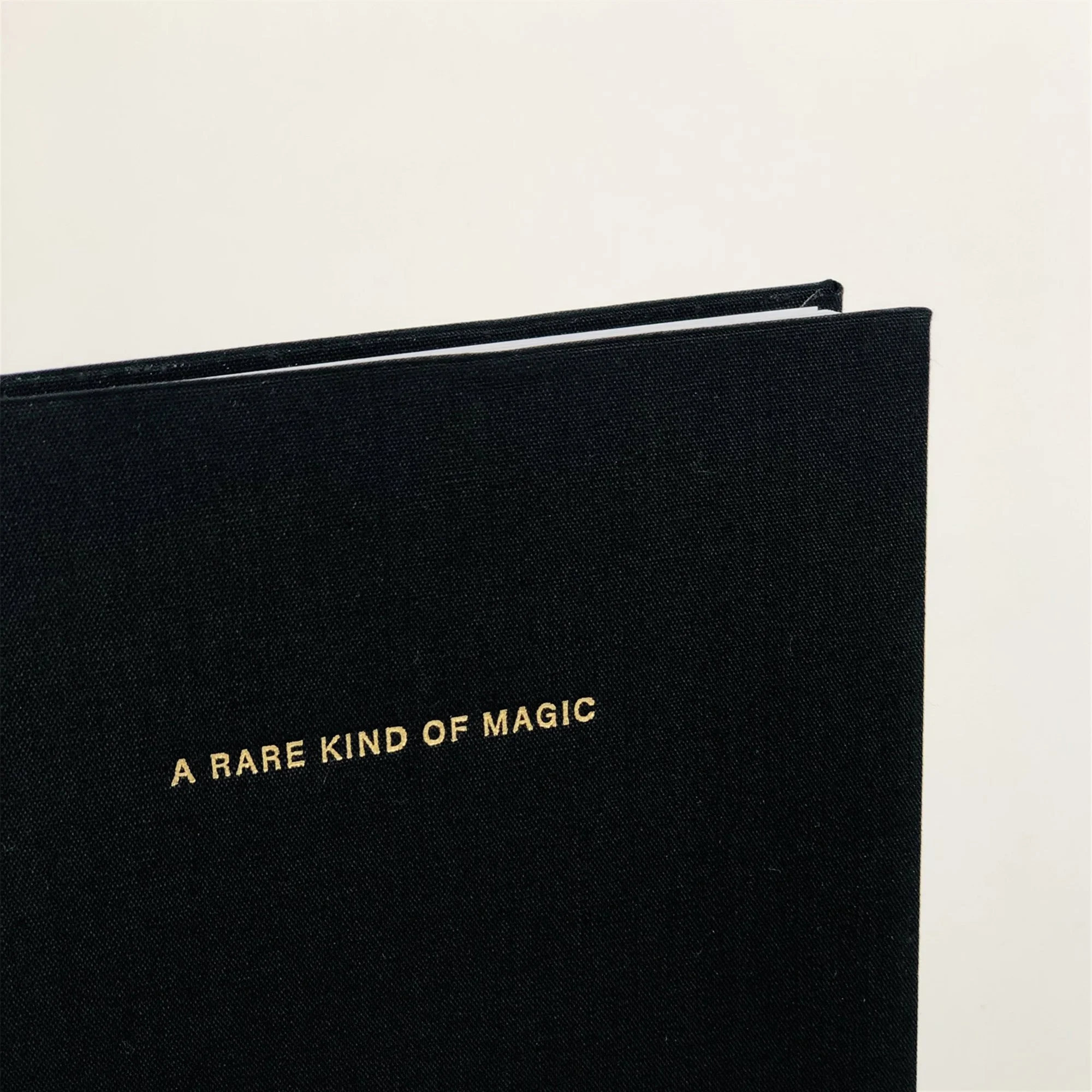 Black Linen Notebook: A Rare kind of Magic in Gold