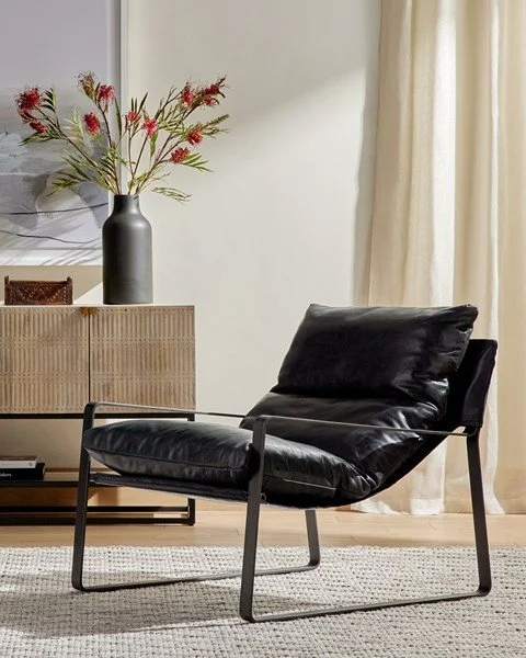 Black Leather Sling Chair Styled.jpg