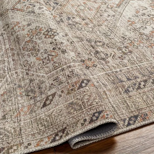Chenille Machine Washable Rug Tan fold.jpg