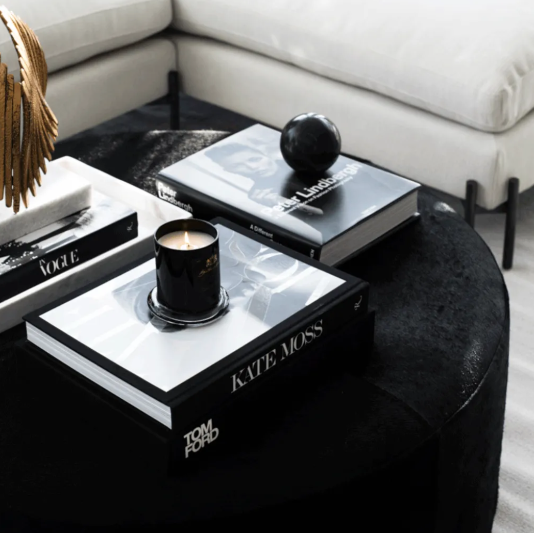 Ebony Leather Cocktail Ottoman Styled.png