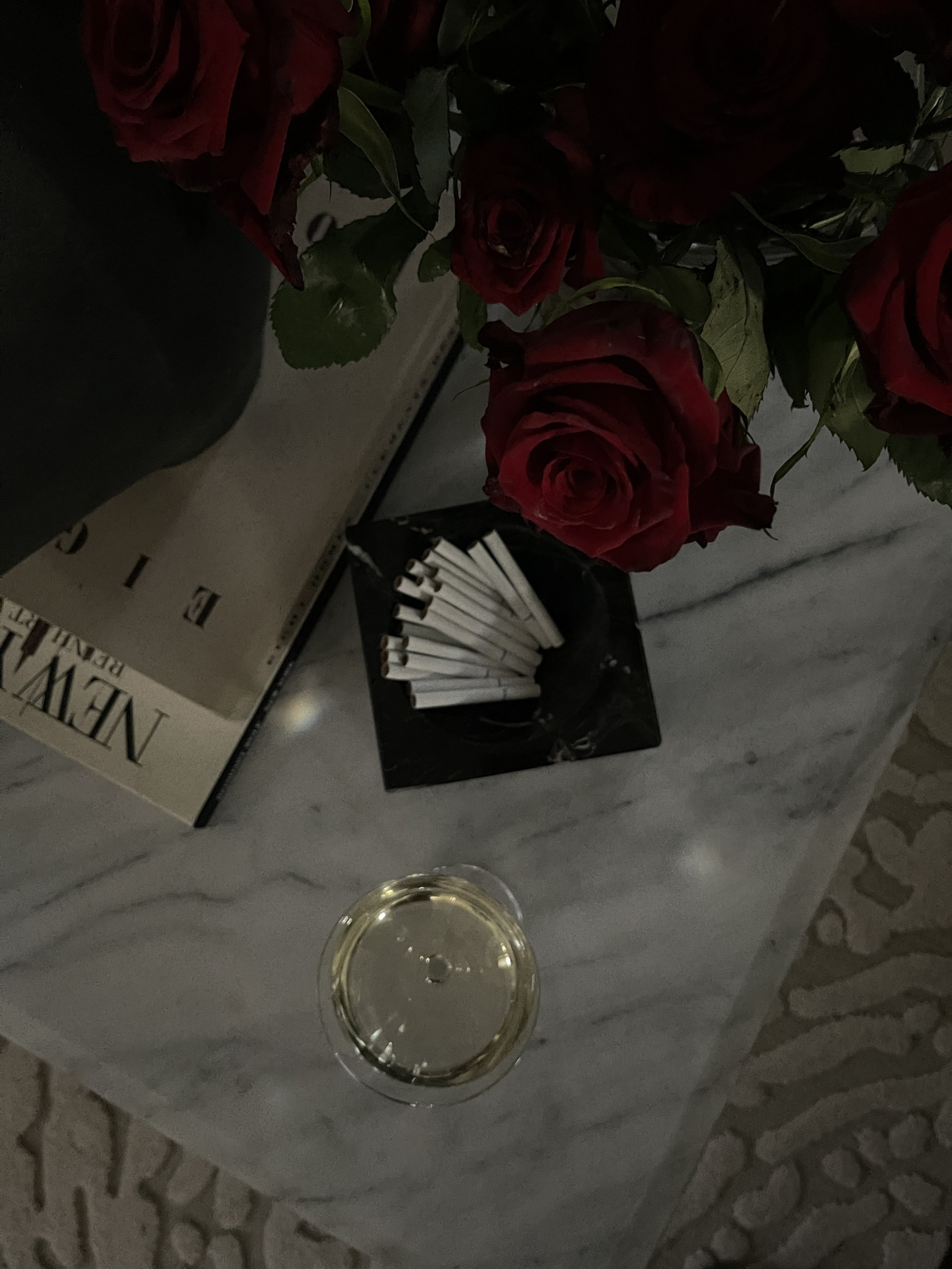 modernist_marblebowl+roses_cigarettes_champagne_styled_coffeetable_franklinave.JPG
