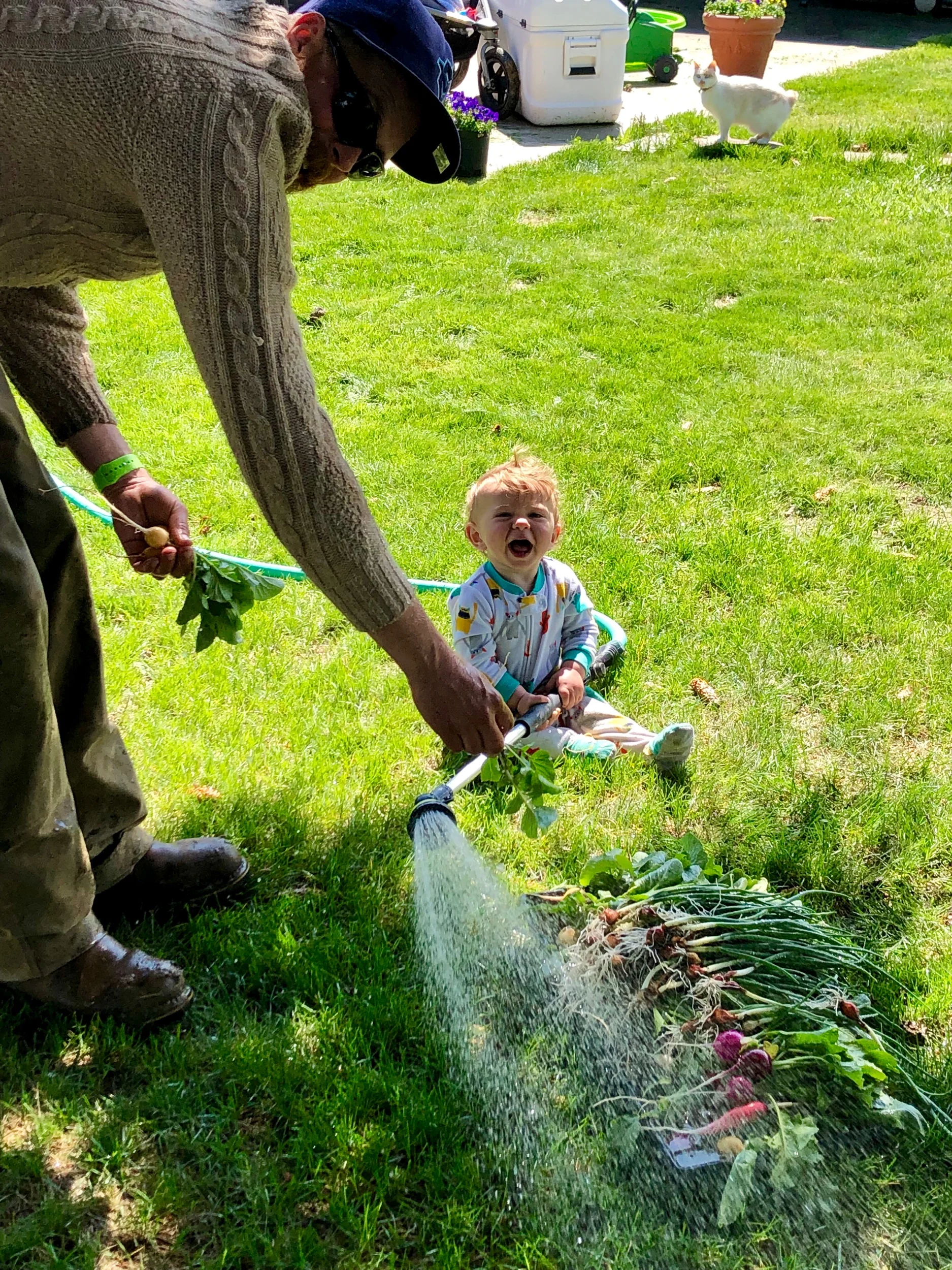 Washing the produce is fun, as you can see…
