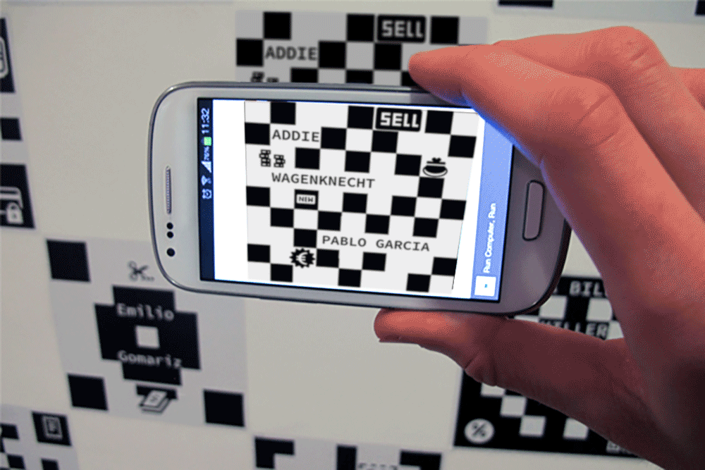 Installation View. The work is embedded in the code posted on the wall. When you point your phone at the code, the GIF loads on top of the code. The piece is made of handmade GIFs animating spinning buffering wheels. Visitors watch and assume they a…