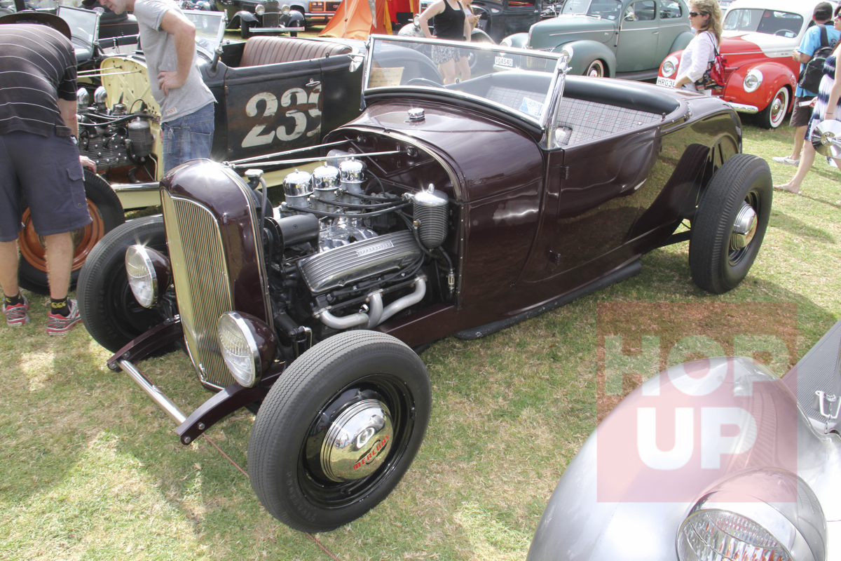 Kelly O’Donnell’s Caddy powered Model A roadster runs a four speed and quick change rear end. Dig the Mercury hubcaps.