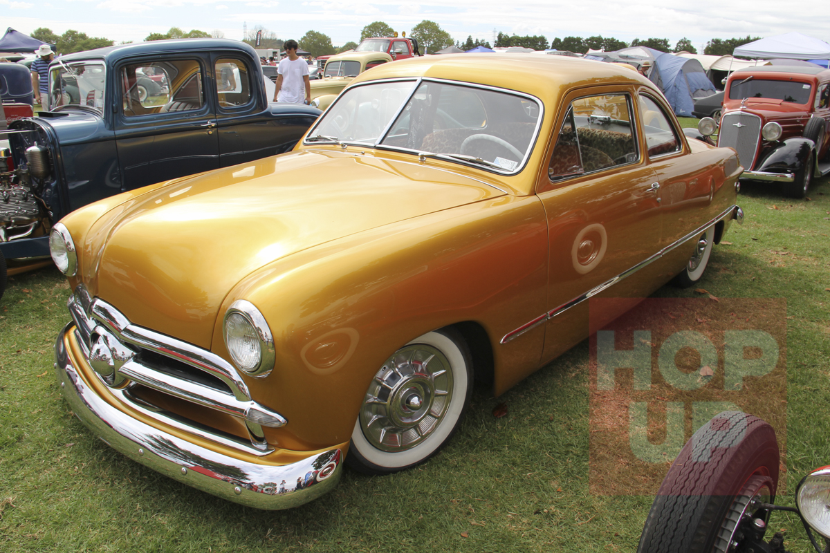Mike Watkins is one of the young guys of the scene with this cool gold ’49 Ford coupe running Caddy hubcaps. He drives it everywhere with a smallblock Ford under the hood.