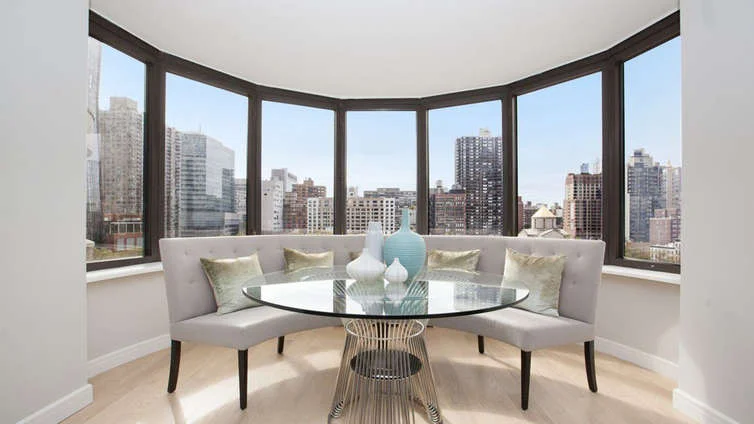 Housed in the historic Murray Hill neighborhood, Corinthian Collection offers 1, 2, and 3 bedroom residences starting from $925K. The residences are stylish and luxurious, encouraging a remarkably convenient lifestyle. Andres Escobar's breathtaking take on the interior exhibits oversized bay windows looking over the bustling surroundings, commendable finishes, a palette of soft, soothing shades, and usage of natural woods. The expansive balconies are airy and provide the residents just the right amount of personal space and time. Along with a range of premium museums, malls, and parks, the neighborhood houses Fairway Market, New York Public Library, and Grand Central. Amenities include a fitness center and spa, fitness and yoga classes, outdoor jogging track, sun deck, and a 24-hour doorman. CITY REALTY ARTICLE The Corinthian at 330 East 38th Street is distinctive and occupies an entire block. Built on the former East Side Airlines site and completed in 1988, it has a distinctive shape of bundled cylinders and offers city and river views. The Corinthian contains 865 units on 54 residential floors that feature hardwood floors and such architectural details as large columns and curved walls. French doors open on to rooms that can be used as libraries or dens. Kitchens have granite countertops and units are equipped with walk-in closets, spacious galleries, washers and dryers and manywindows. Every apartment – with the exception of studios – has a balcony, and some of the larger residences have more than one. Many apartments have been updated to include state-of-the-art appliances. The Corinthian’s amenities include a full-service health club with a glass-enclosed pool, sauna, steam room, Jacuzzi, outdoor jogging track and a sun deck. There is also a full-time doorman and concierge, valet service and a garage. Located in Murray Hill, the building is situated close to the East River and the Midtown business district. CONTACT US FOR MORE INFORMATION ABOUT THIS AND OTHER NEW DEVELOPMENTS IN NYC, BROOKLYN & QUEENS!
