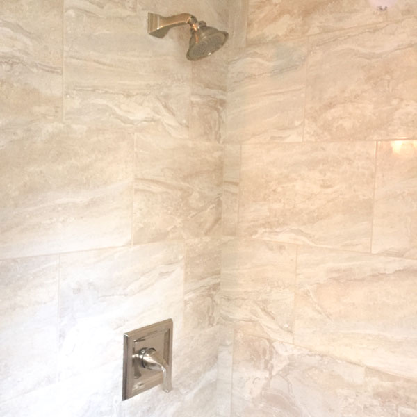 bathroom-shower-tile-detail-showerhead.jpg