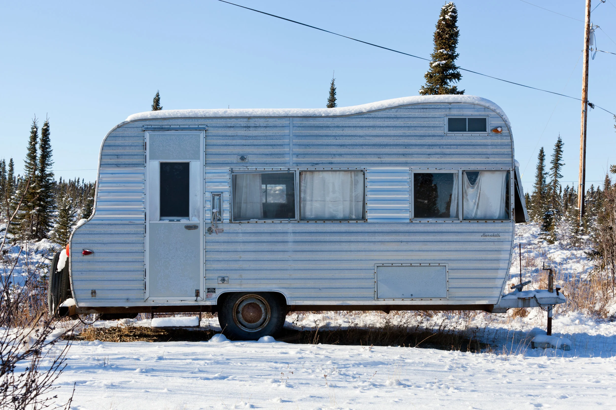 I never figured out who owned this camper trailer. Shot with a Canon 5D Mark II.