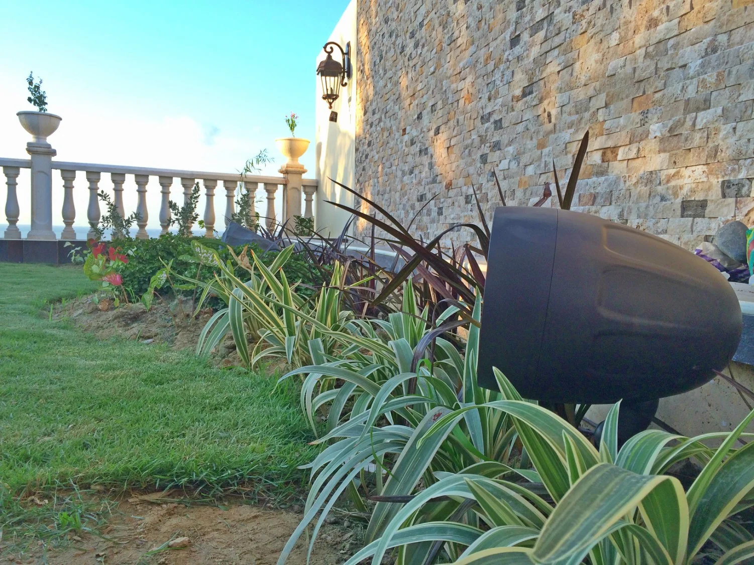 Landscape style speakers can blend into foliage while spreading acoustic joy