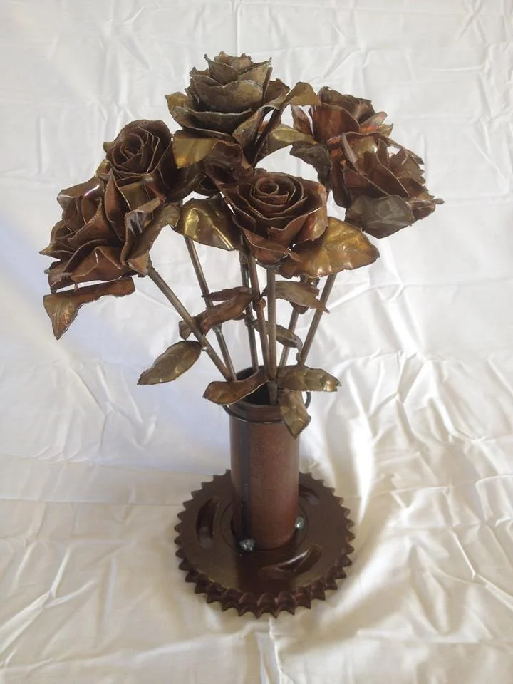 Copper roses in gear based vase
