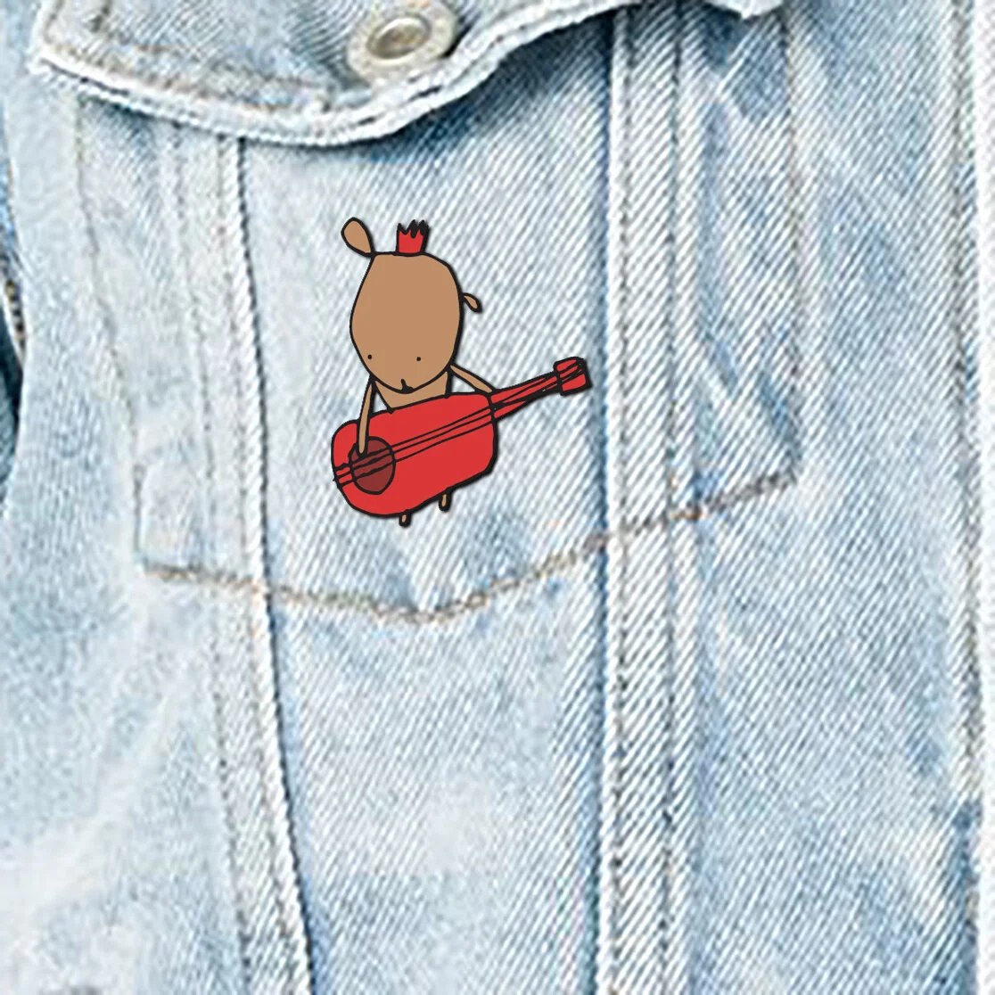 Enamel_Badge_on_jacket_TBLLT.jpg