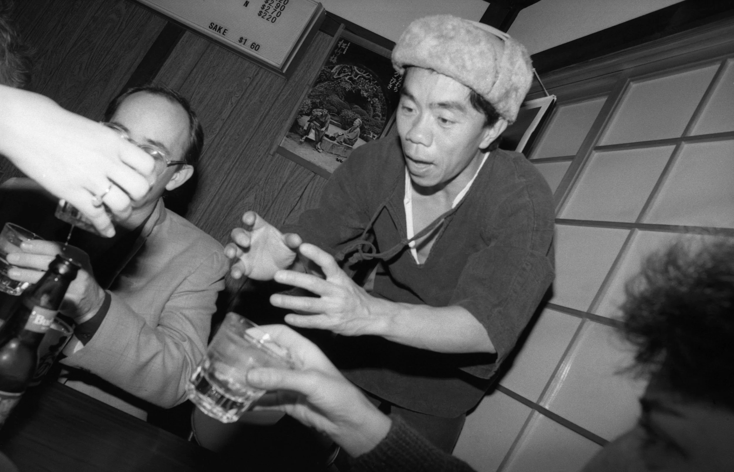 Hisao et al a-tippling. Los Angeles, January, 1982.