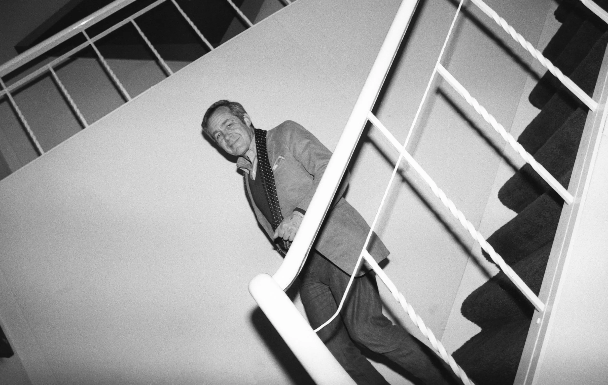 Jack Larson, a musician best known for his role as Jimmy Olsen in the 1950s TV series "Superman," at Betty Freeman's salon for Philip Glass, 1981.