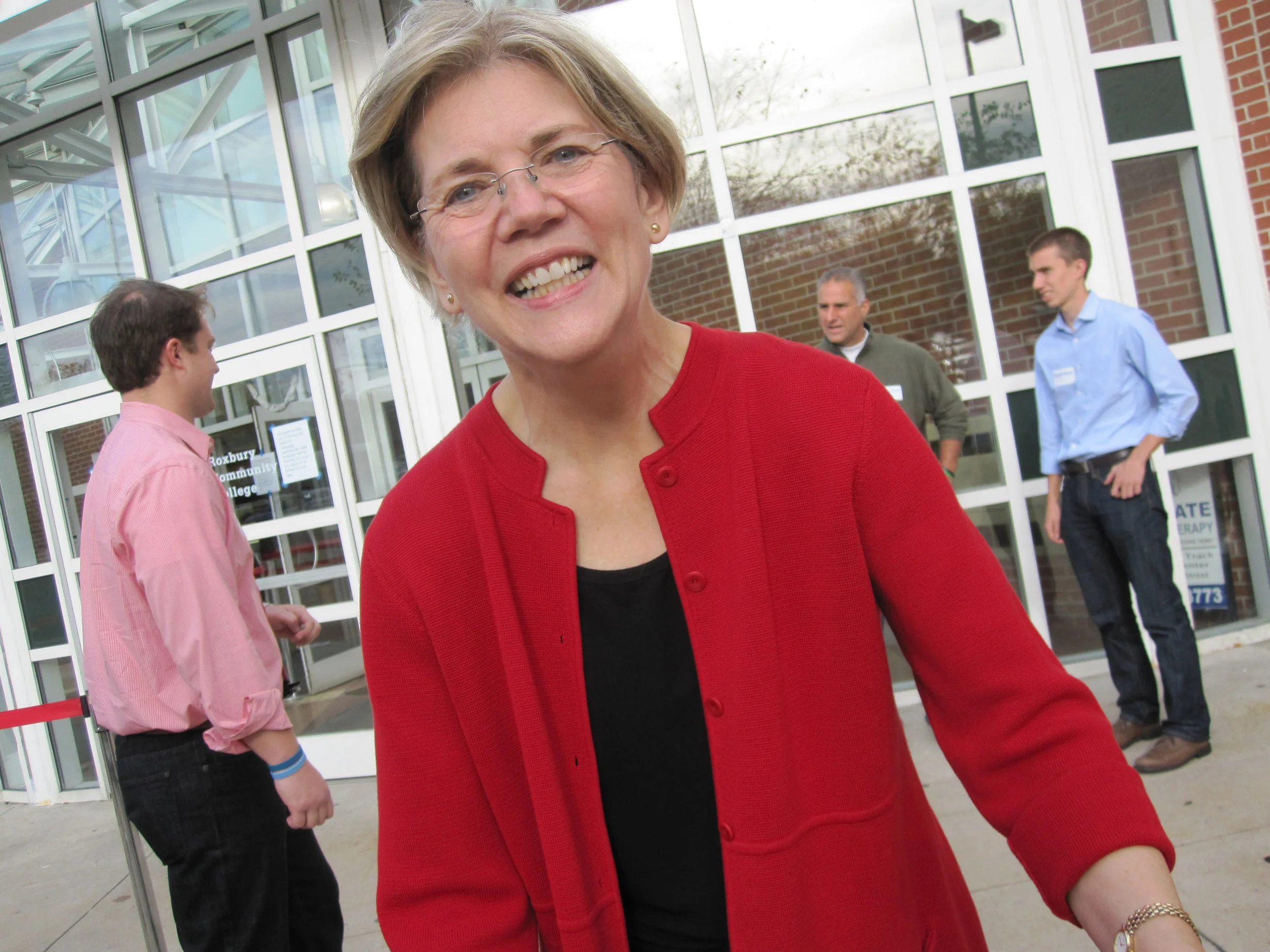Greeting attendees at a rally for volunteers for her Senate campaign, Nov 13 2011, Roxbury area of Boston MA.