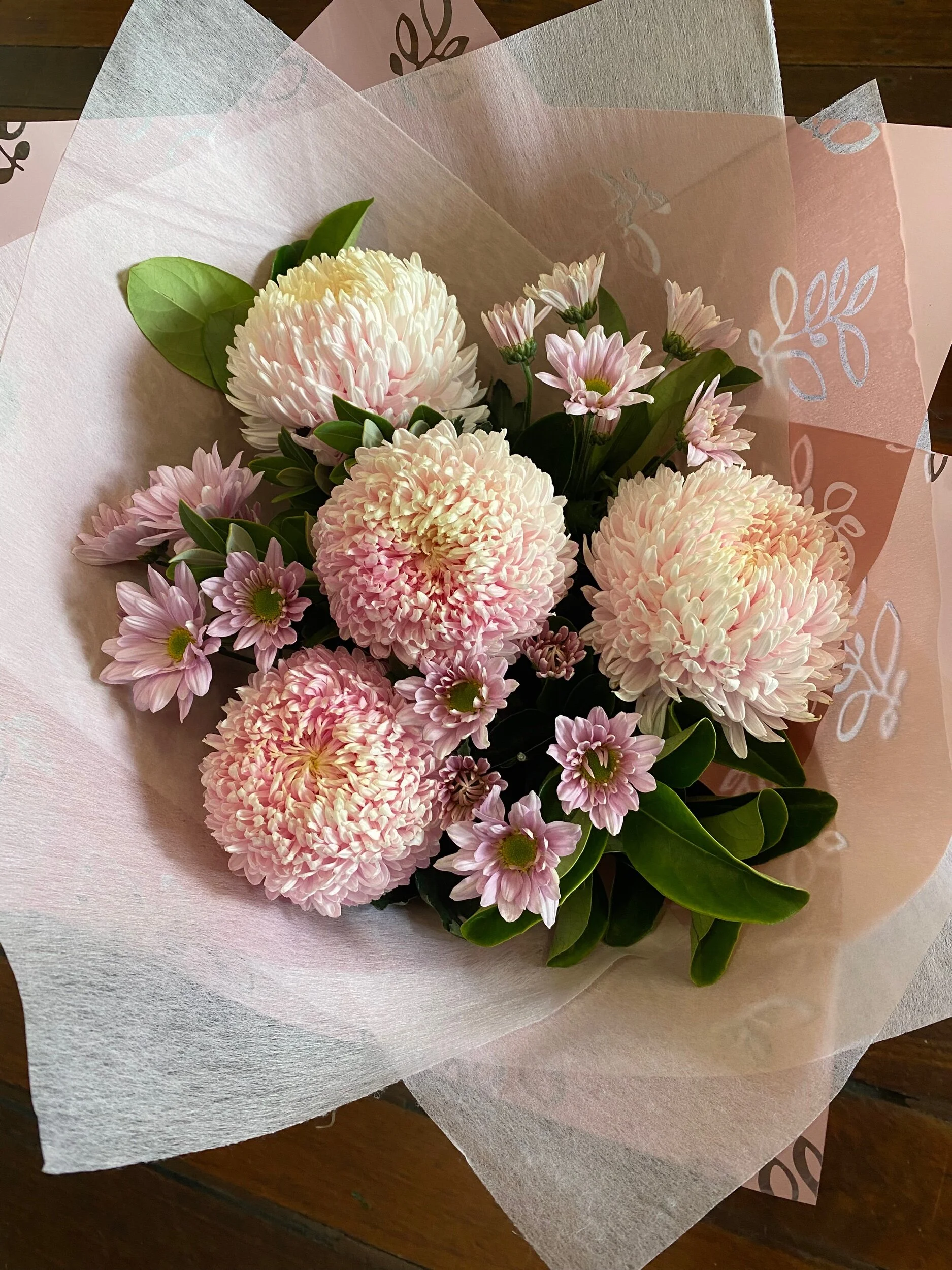pale pink disbud chrysanthemum and spray chrysanthemum presented as a  fresh flower pastel bouquet