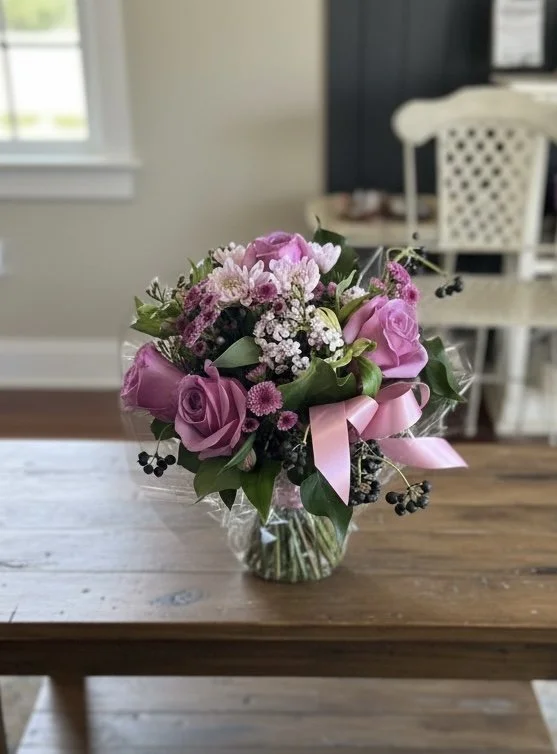 Mauve fresh flower glass cube arrangement with roses, chrysanthemums and alstroemeria by Lilypilly