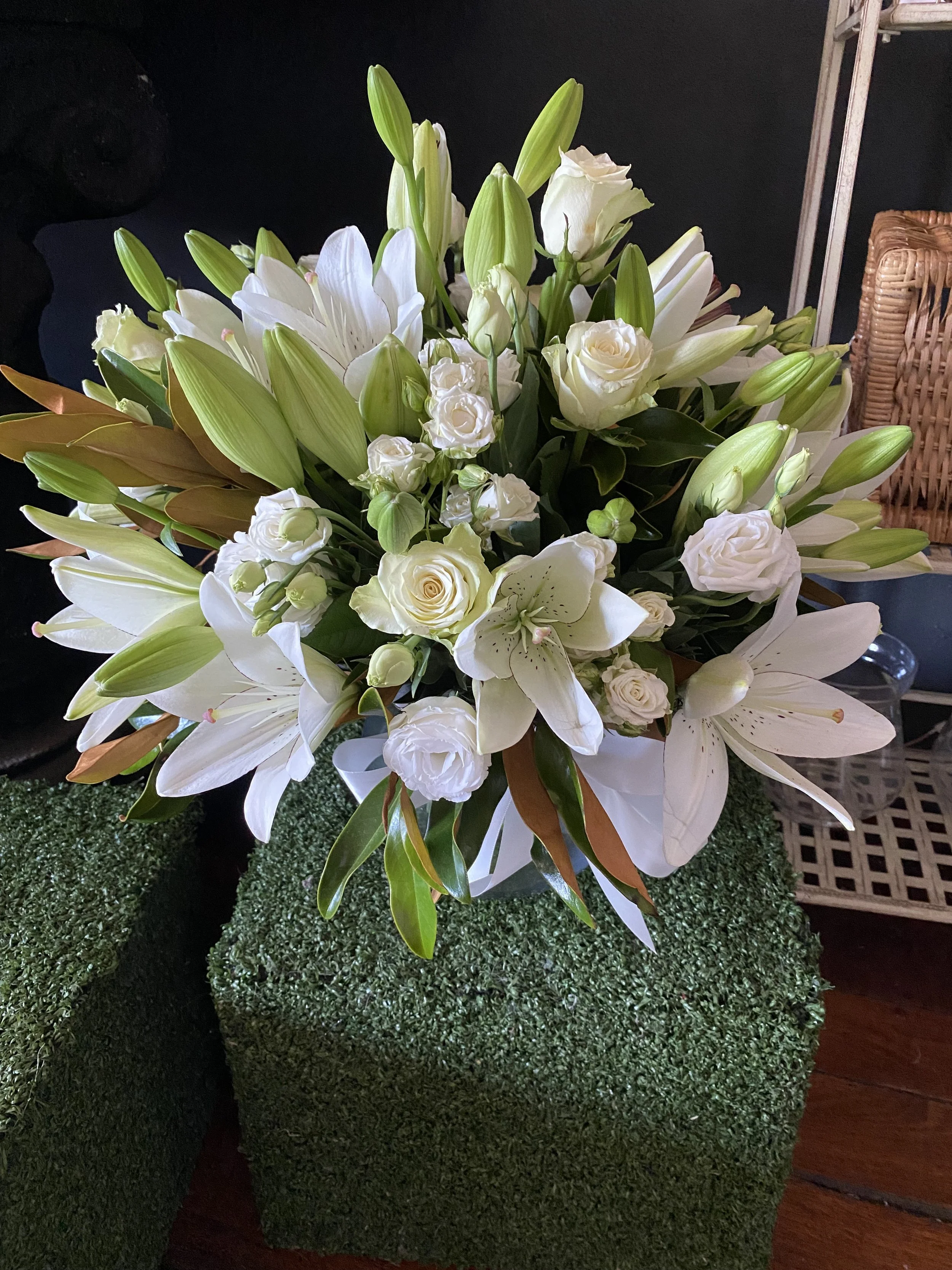 white rose and lily arrangement