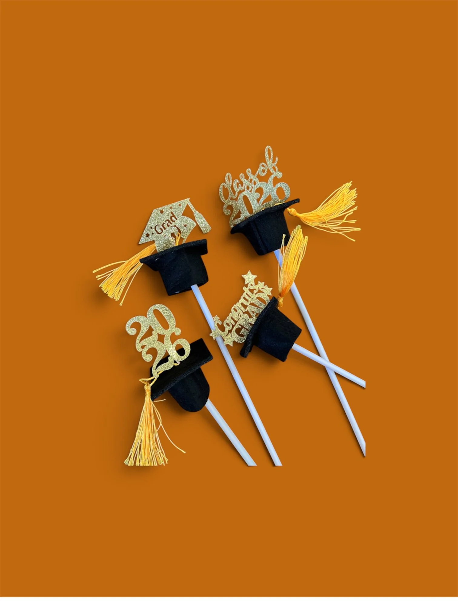 Decorative graduation cap pick with Class of 2026 and Congrats Grad wording, designed as an add-on for flower bouquets.