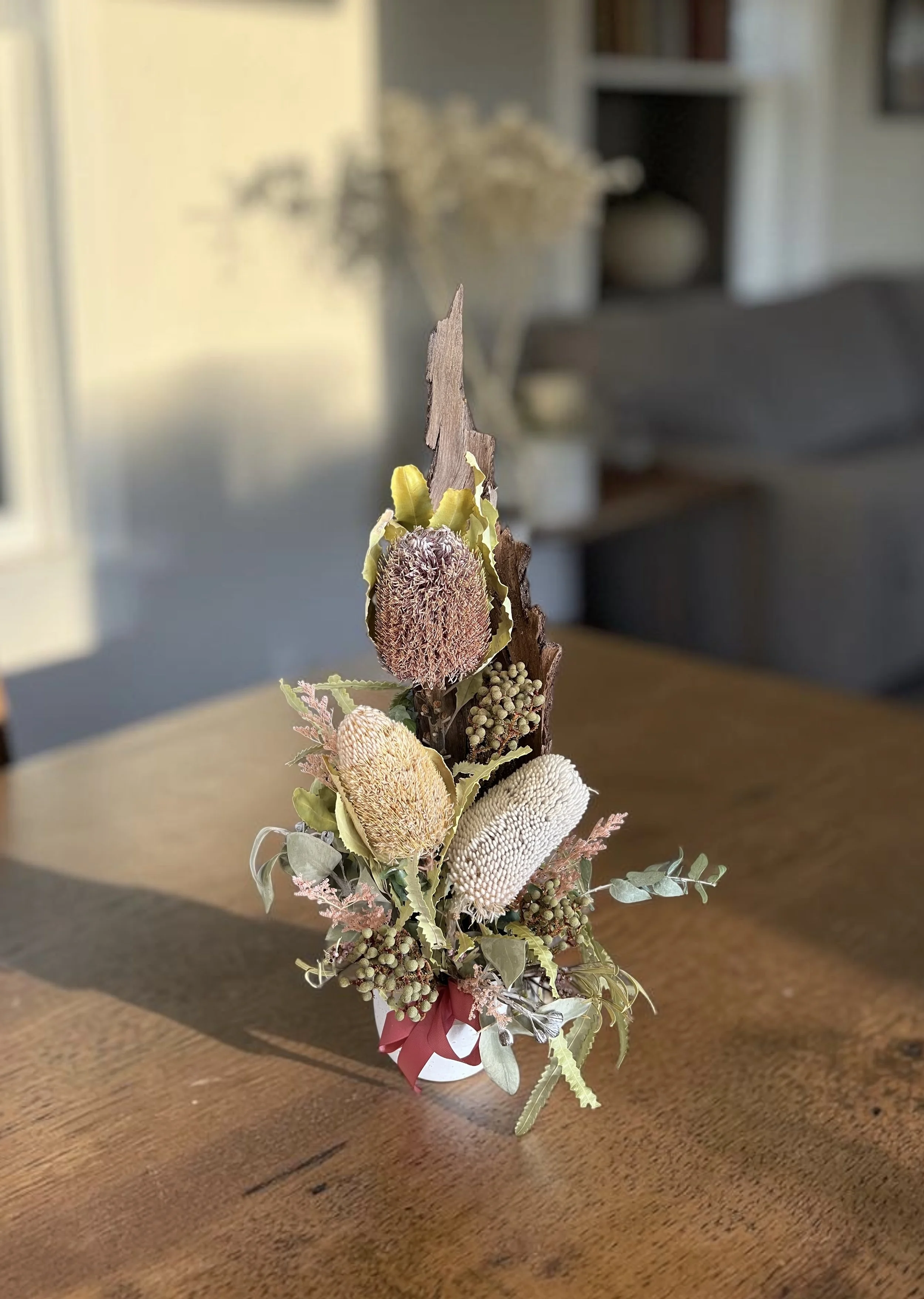 Bushland Blooms everlasting arrangement featuring premium Australian dried native flowers, natural bark and preserved botanicals presented in a ceramic pot by Lilypilly Florist South Perth.