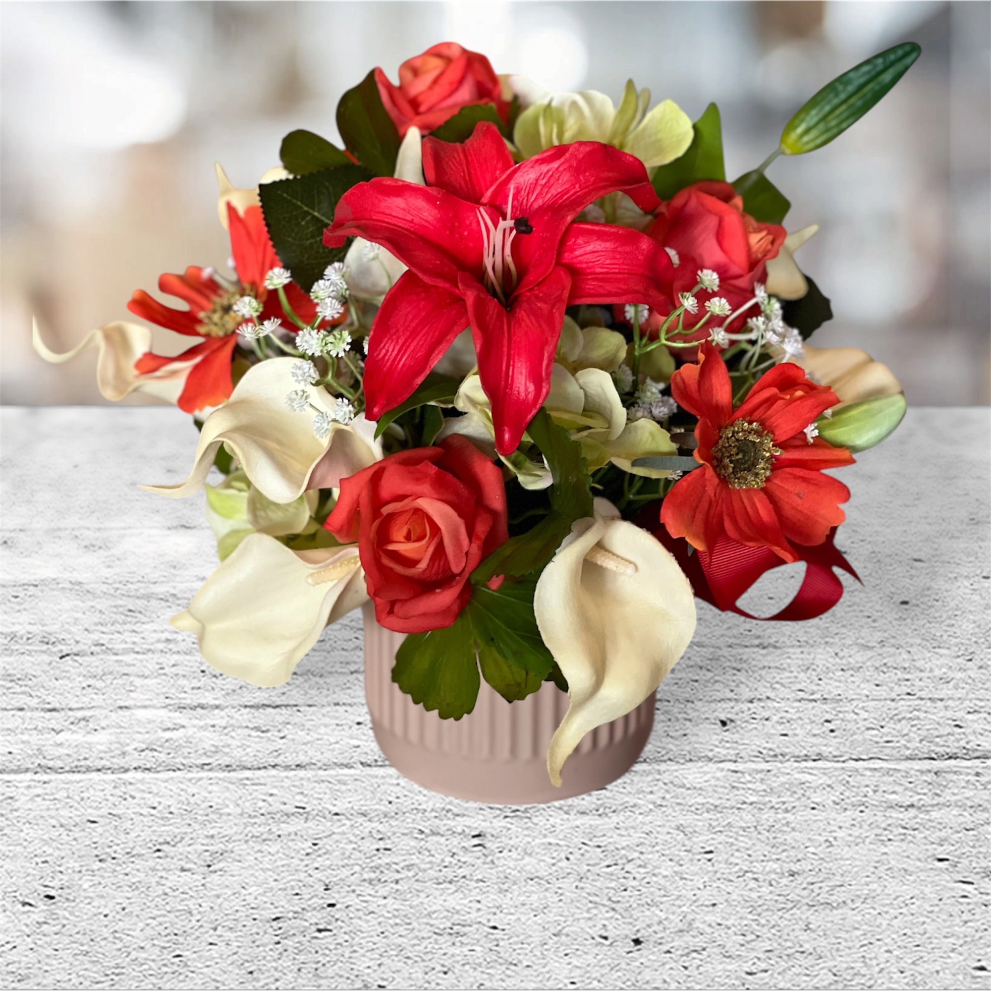 Lily Delight a real touch silk arrangement of roses, calla lilies, red lily in ceramic pot