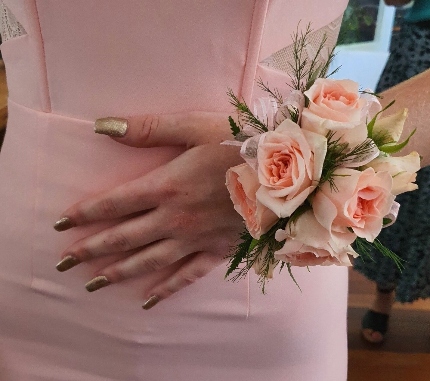 Elegant fresh pale pink rose corsage with featuring greenery handcrafted floral