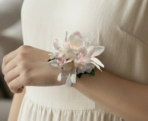 pretty pale pink corsage on model by lilypilly