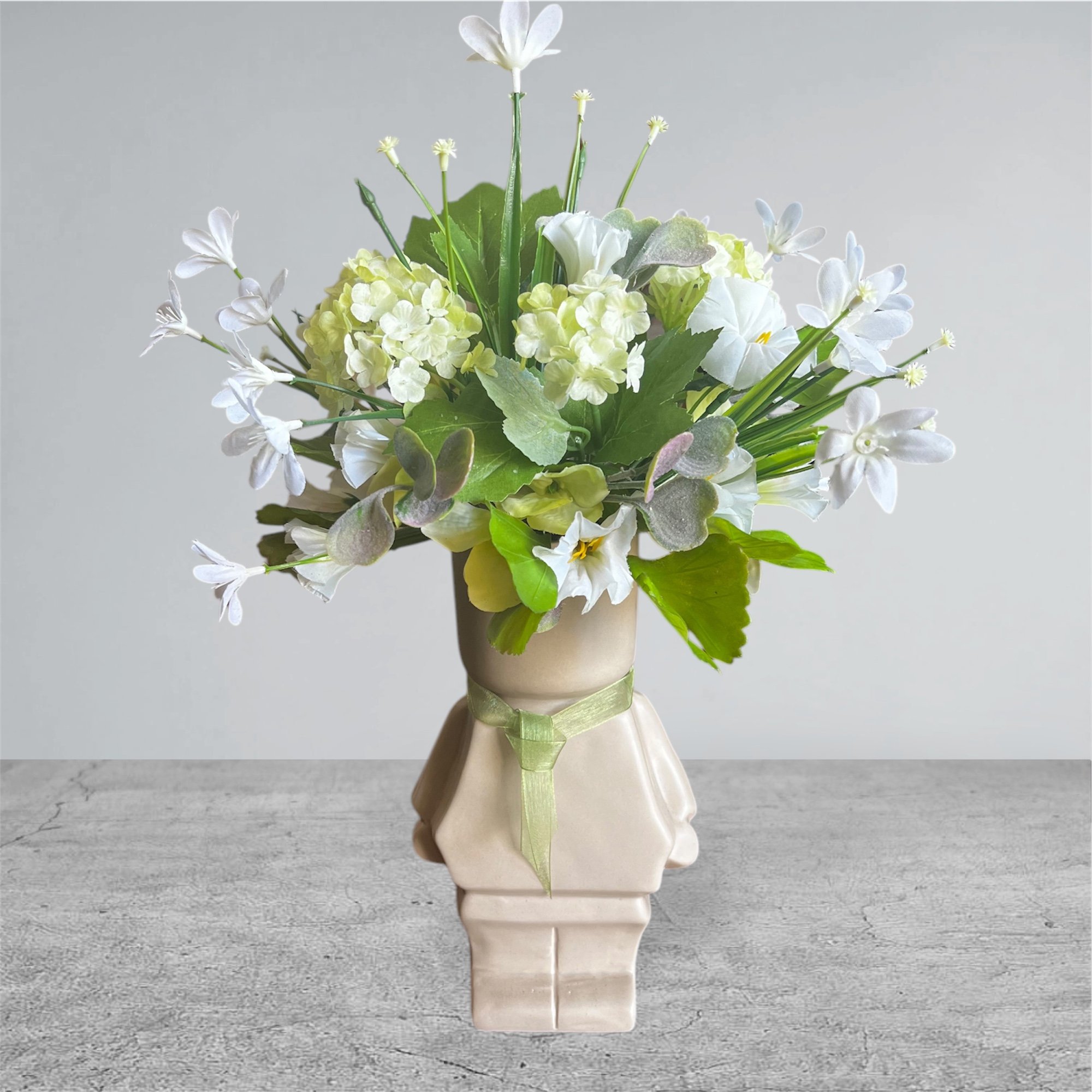 Robot ceramic pot with pretty white and green silk flowers