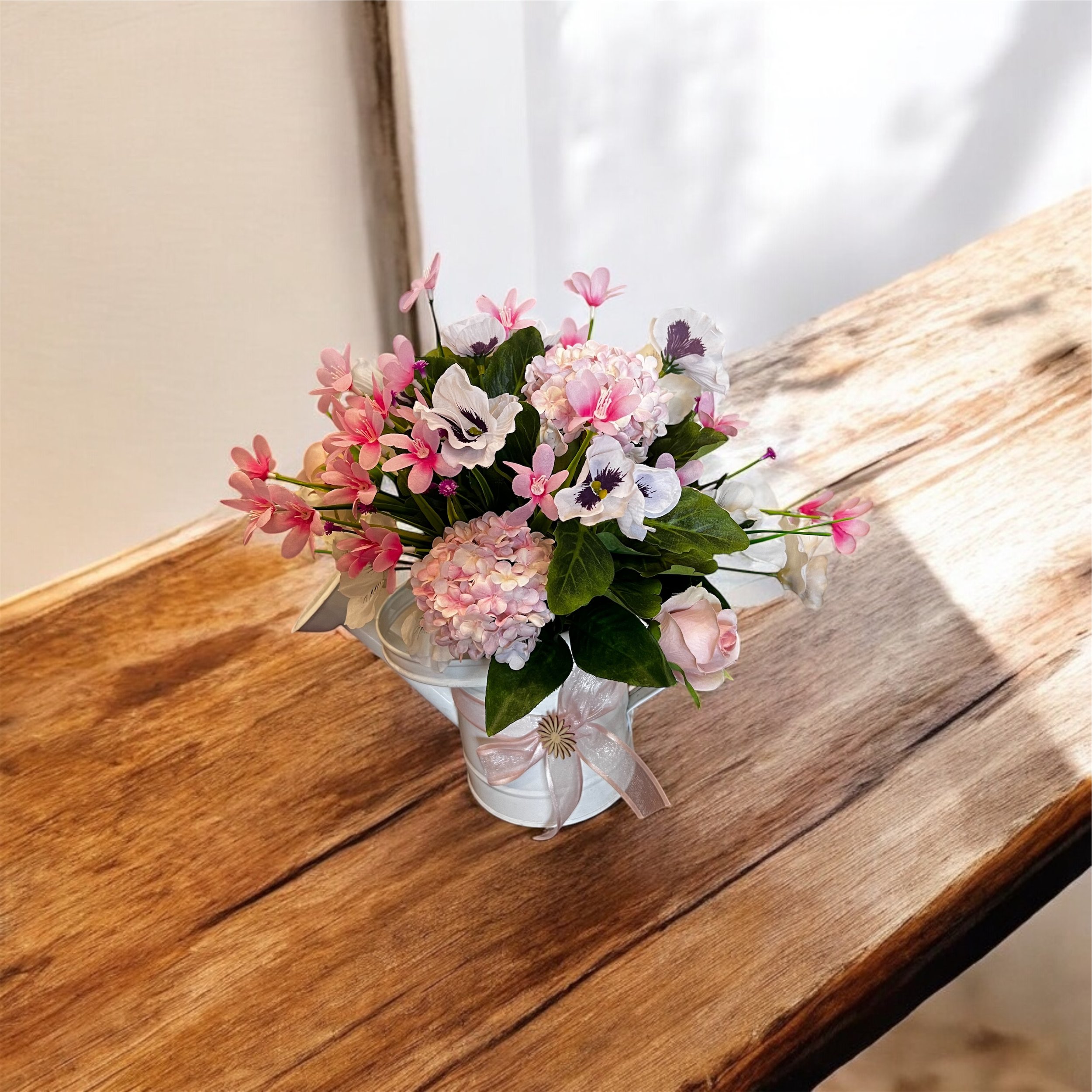 Pretty in pink silk flower watering can arrangement