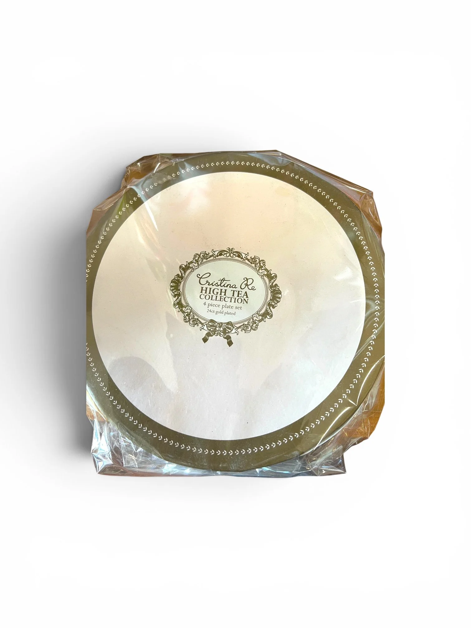 Christina Re white plate set with 24ct gold edging displayed as a luxury high tea gift.