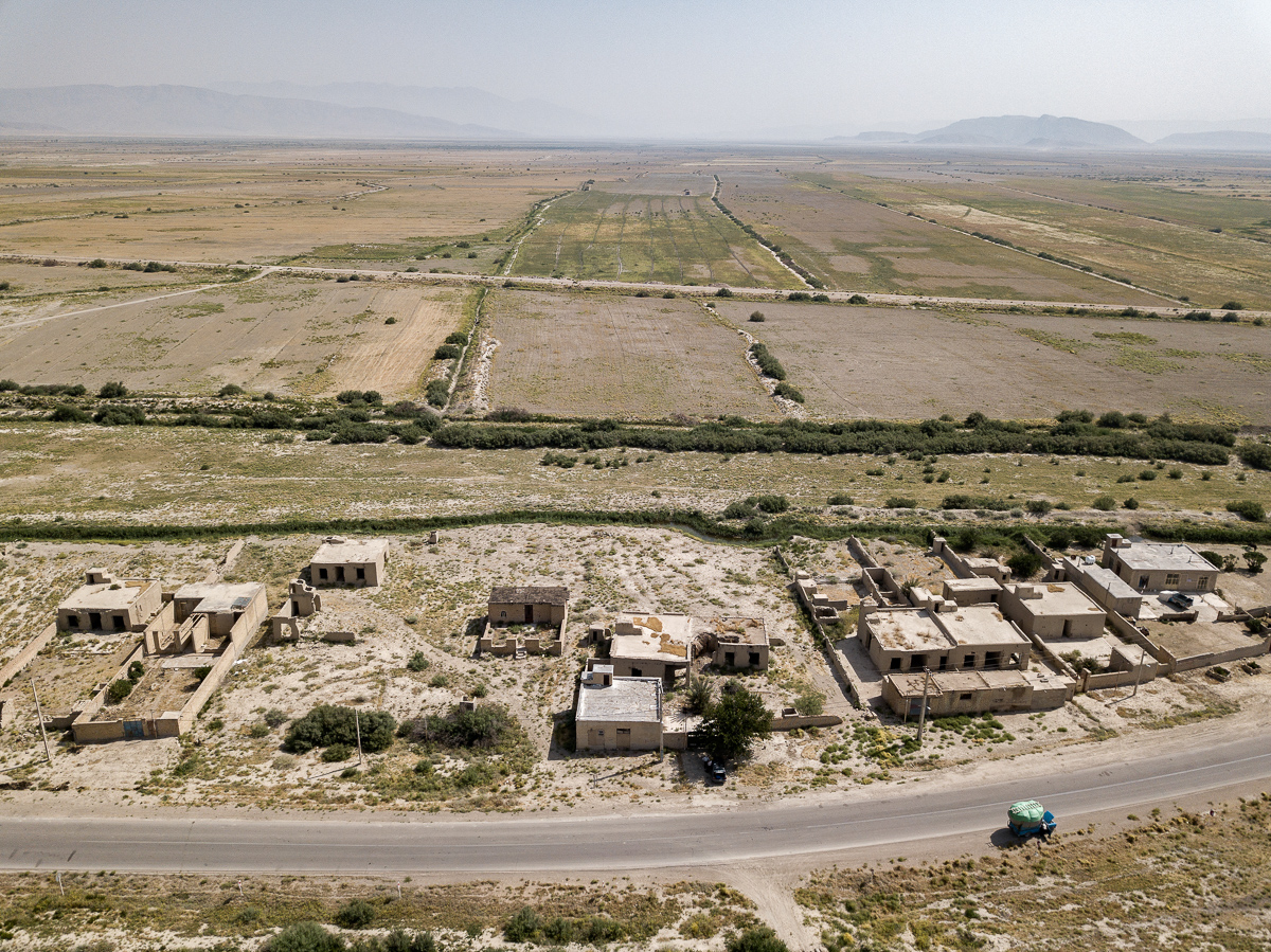  Only 100 km far from Kamfiruz, Korbal Plain, July 2019. This is one of the dozens of abandoned villages in the area. The fields in the background are a part of 14,000 hectares that were rice fields before the persistent drought began, and they are a