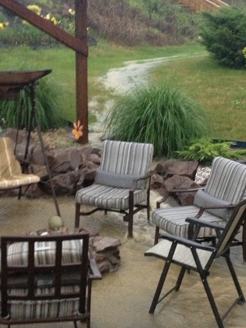 Notice the water run off from the neighboring property after a heavy rainfall....