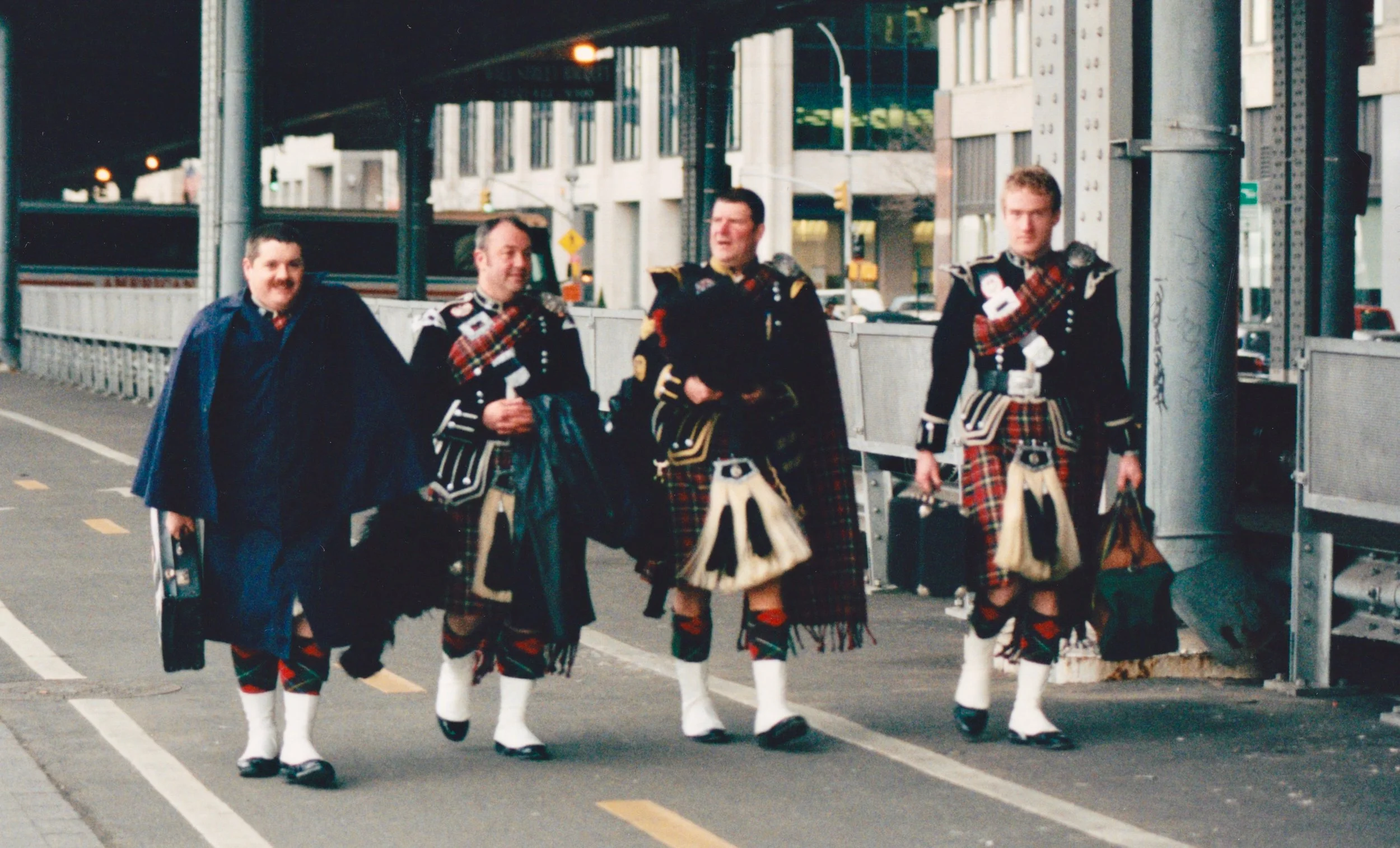 Only we could play at the launch of a bus company and have to walk back to the hotel. Left to right: Davy Elder, Les Watson, Me and Matt Donaldson