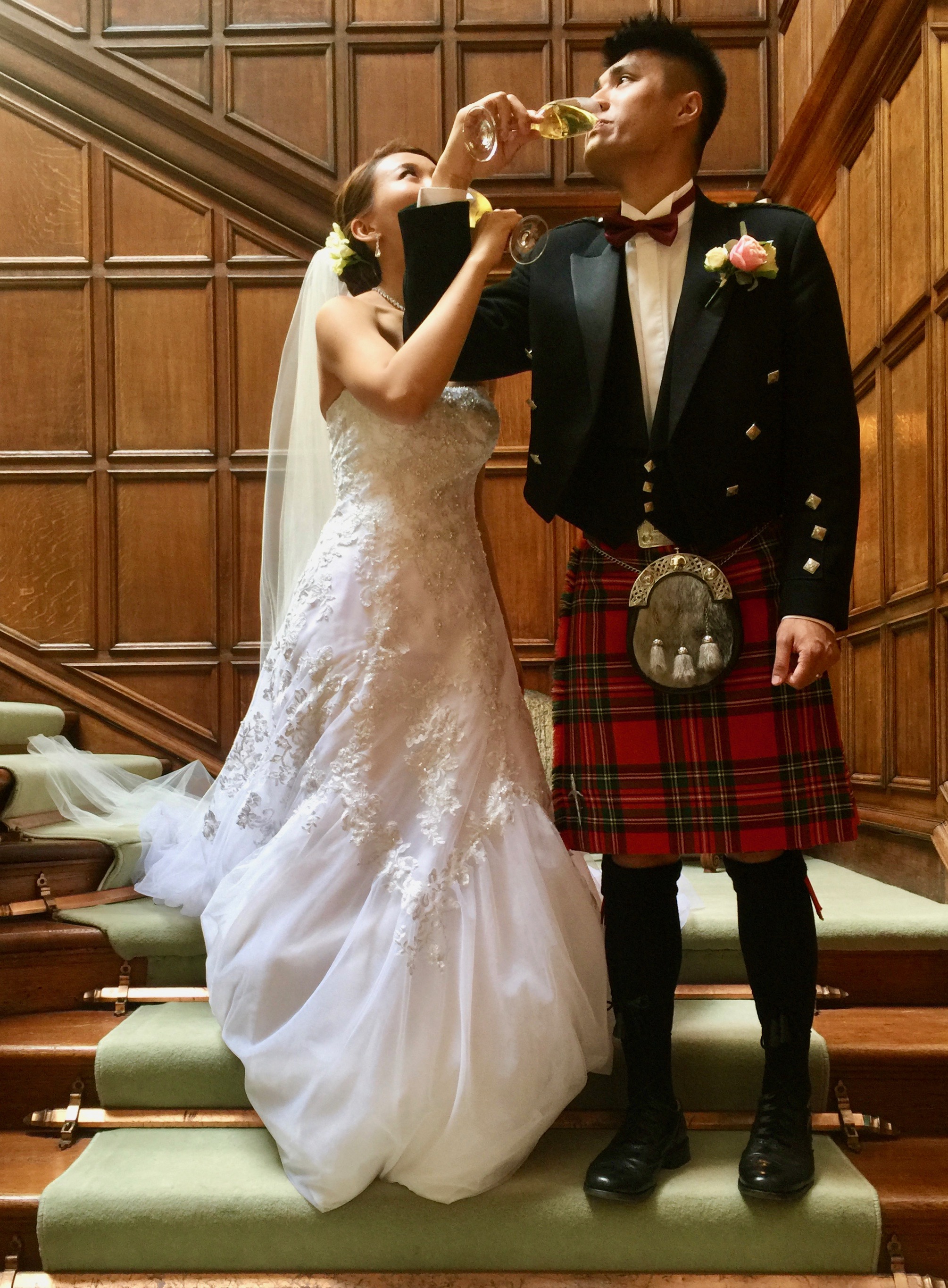 Ching Yan Chan and Jacey Ma raise glass of fizz