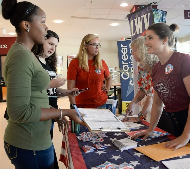 League+of+Women+Voters+Bloomington+LWVB+distributes+Voter+Guides.jpeg