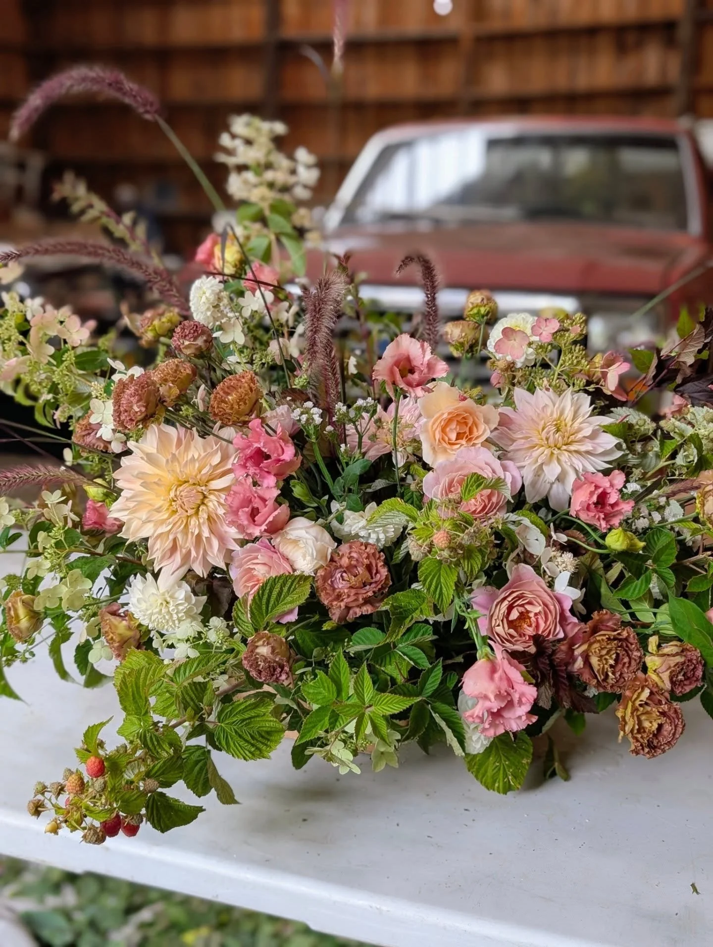 We had a really fun, productive week in the new barn space. Creating romantic, autumnal wedding florals for a special couple at one of our favorite venues. All of the lush, greenery and anemones were cut from our farm while the bulk of flowers were o