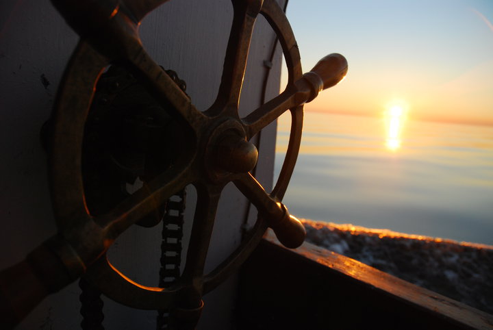 The Spiteful Lady's brass wheel, cog and chain were one of the many gifts. Carl Hedderson, a fisherman from nearby Noddy Bay, gave us the wheel that came off his father's trapskiff.