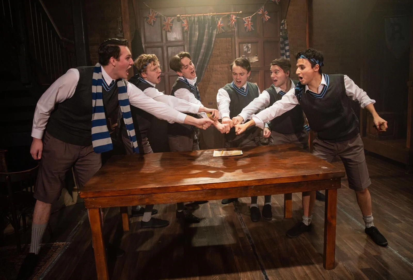  “Reuben Speed dishes up an attractive design of a realistic pair of trucks with a smattering of real looking furnishings” – British Theatre  “Reuben Speed’s multi-functional set looks every inch the public school” - The Reviews Hub.  “There is hands