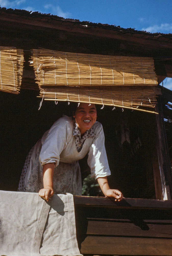104 Woman in Window with Metal Teeth